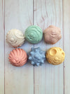 Set pelotas pasteles para baño con diferentes texturas